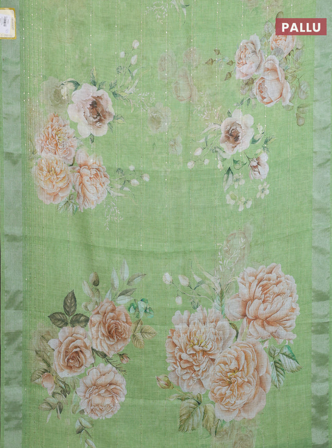 Linen cotton saree light green with floral prints & sequin work and silver zari woven border