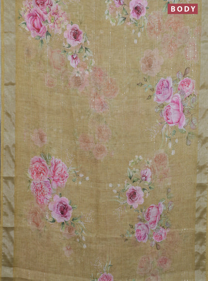 Linen cotton saree mustard shade with floral prints & sequin work and silver zari woven border