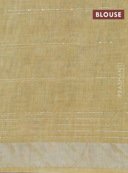 Linen cotton saree mustard shade with floral prints & sequin work and silver zari woven border