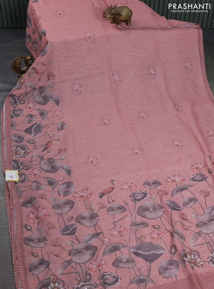 Linen cotton saree rust shade with floral prints & embroidery buttas and long printed embrodery border