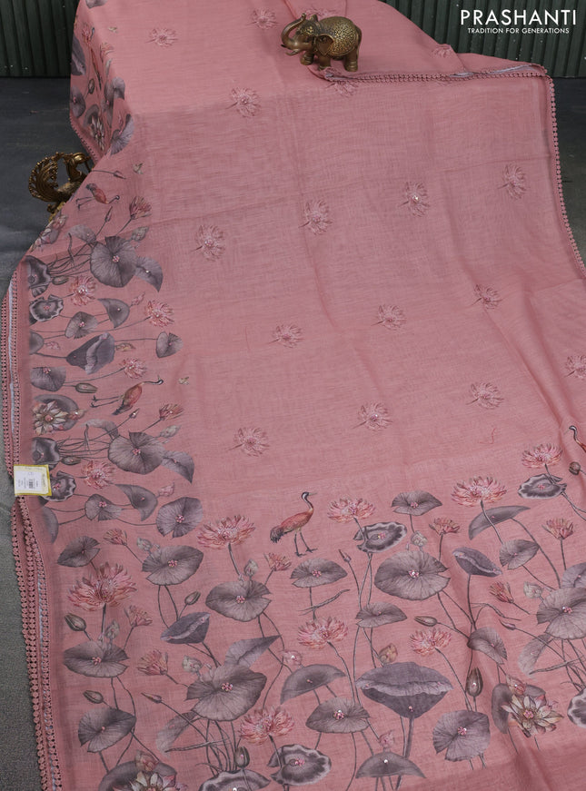 Linen cotton saree rust shade with floral prints & embroidery buttas and long printed embrodery border