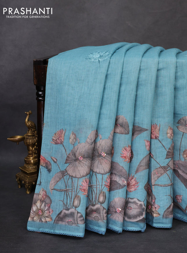 Linen cotton saree pastel blue with floral prints & embroidery buttas and long printed embrodery border