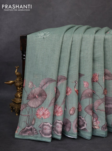 Linen cotton saree paatel green shade with floral prints & embroidery buttas and long printed embrodery border