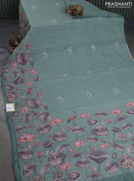 Linen cotton saree paatel green shade with floral prints & embroidery buttas and long printed embrodery border