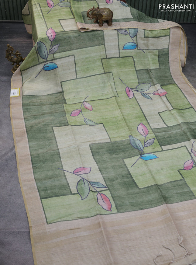 Semi matka saree pastel green and green beige with allover geometric prints and zari woven border