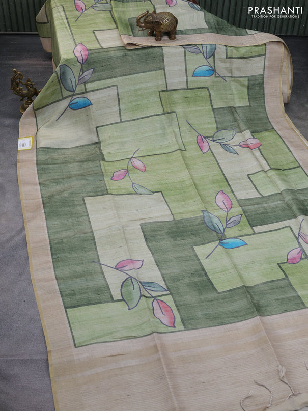 Semi matka saree pastel green and green beige with allover geometric prints and zari woven border