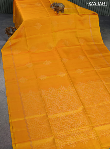 Pure soft silk saree mango yellow with zari woven rangoli design and zari woven simple border