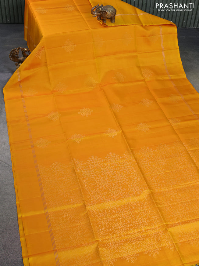 Pure soft silk saree mango yellow with zari woven rangoli design and zari woven simple border