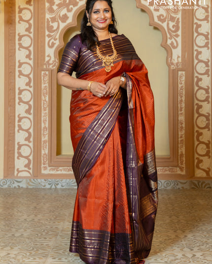 Pure soft silk saree rust and purple with allover zari weaves and long rich zari border