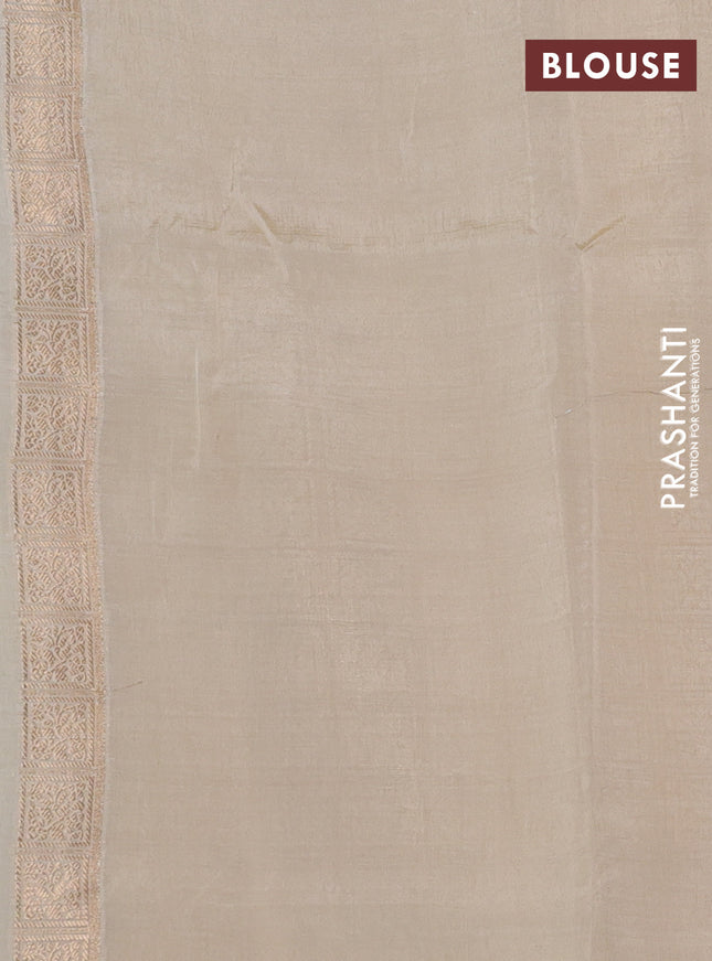 Banarasi tissue semi silk saree off white and cream with zari weaves & floral buttas and silver zari woven butta border