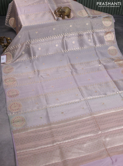 Banarasi tissue semi silk saree pastel grey with zari weaves & buttas and zari woven butta border