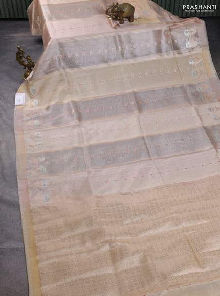 Banarasi tissue semi silk saree sandal with zari weaves & buttas and floral zari woven butta border