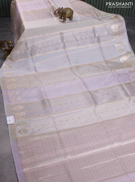 Banarasi tissue semi silk saree beige and pastel lavender with zari weaves & buttas and floral zari woven butta border