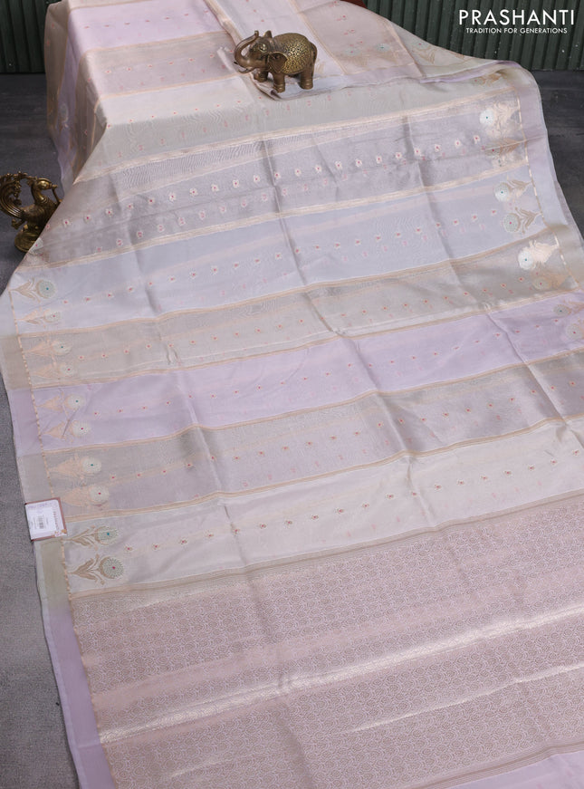 Banarasi tissue semi silk saree beige and pastel lavender with zari weaves & buttas and floral zari woven butta border