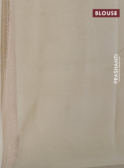 Banarasi tissue semi silk saree off white and cream with zari weaves & buttas and zari woven tree butta border