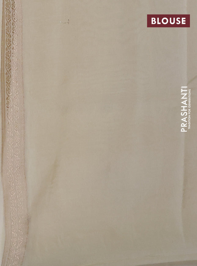 Banarasi tissue semi silk saree off white and cream with zari weaves & buttas and zari woven tree butta border