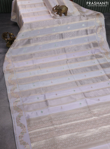 Banarasi tissue semi silk saree pastel grey with zari weaves & buttas and zari woven border