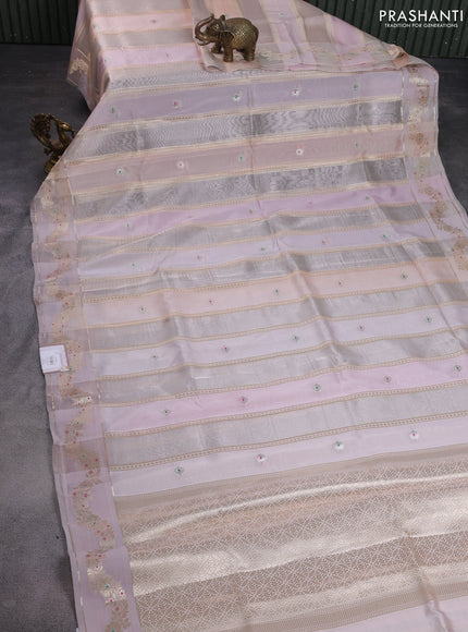 Banarasi tissue semi silk saree pastel peach with zari weaves & buttas and zari woven border