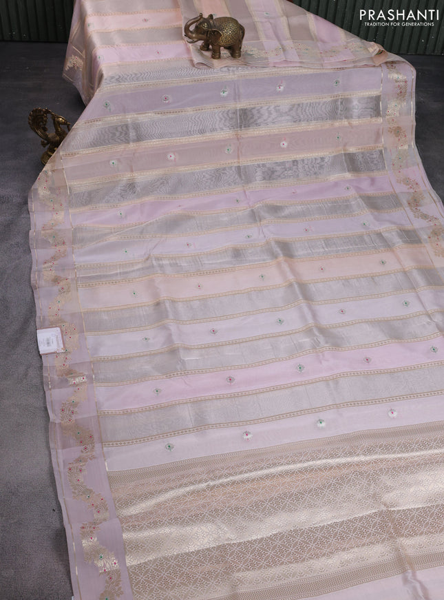 Banarasi tissue semi silk saree pastel peach with zari weaves & buttas and zari woven border