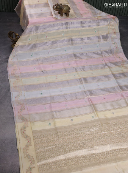Banarasi tissue semi silk saree mild peach and cream with zari weaves & buttas and zari woven border
