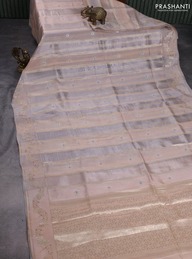 Banarasi tissue semi silk saree pastel peach shade with zari weaves & buttas and zari woven border