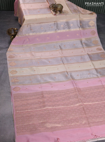 Banarasi tissue semi silk saree peach pink and pale orange with zari weaves & buttas and zari woven butta border