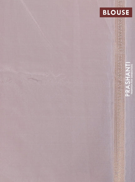 Banarasi tissue semi silk saree peach pink and pale orange with zari weaves & buttas and zari woven butta border