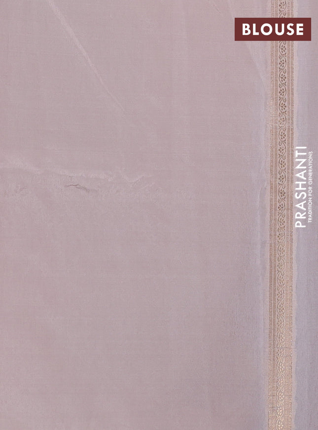 Banarasi tissue semi silk saree peach pink and pale orange with zari weaves & buttas and zari woven butta border