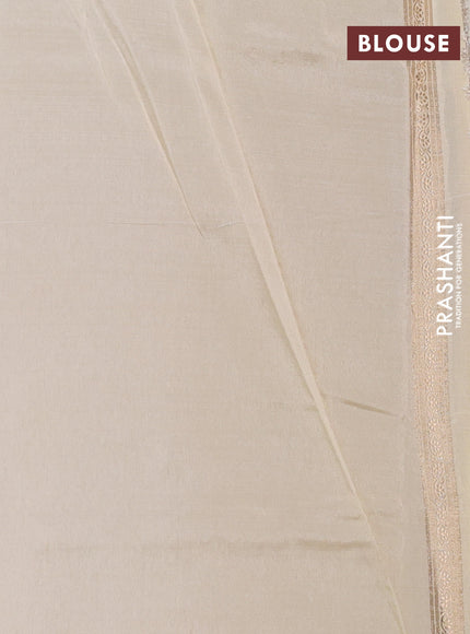 Banarasi tissue semi silk saree off white and cream with zari weaves & buttas and zari woven butta border