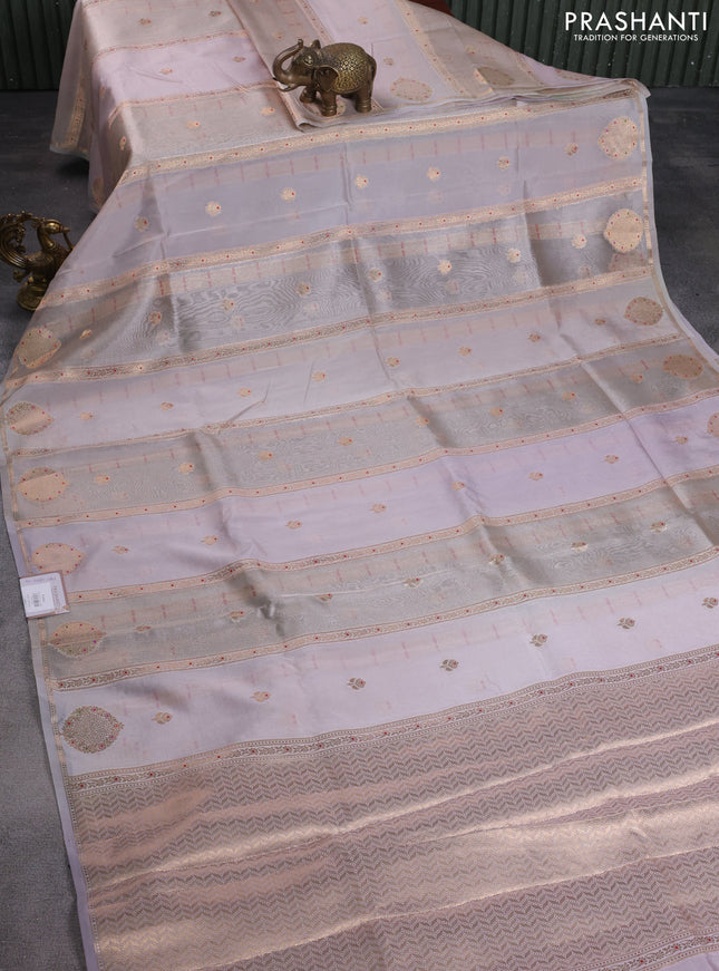 Banarasi tissue semi silk saree grey shade and pastel lavender with zari weaves & buttas and zari woven butta border