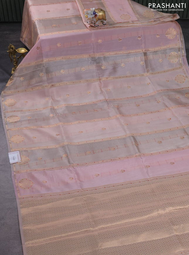 Banarasi tissue semi silk saree pastel peach with zari weaves & buttas and zari woven butta border