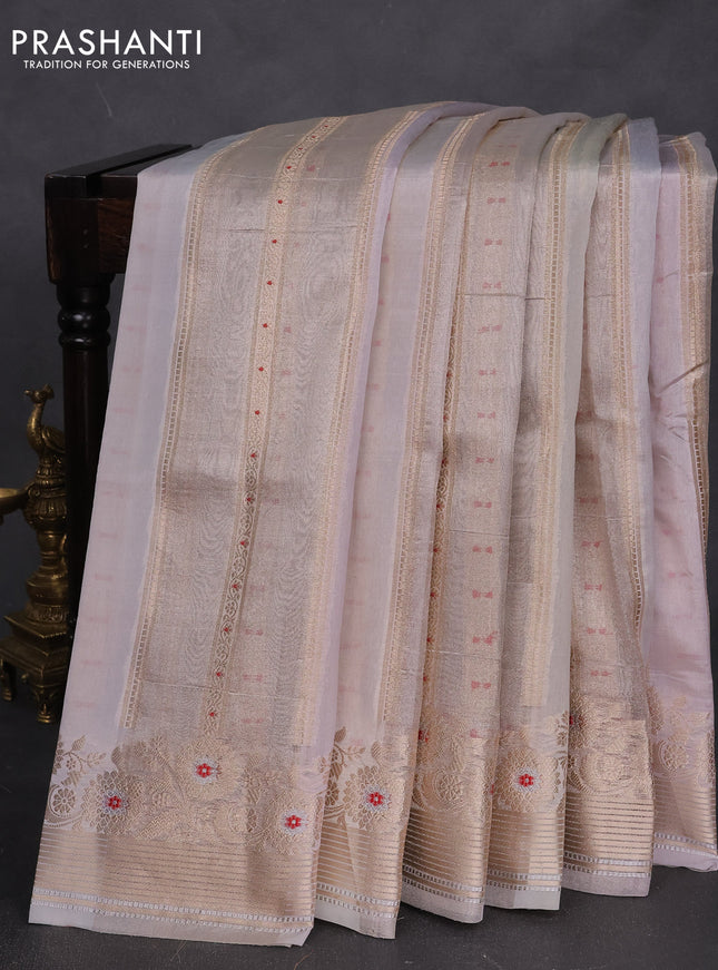 Banarasi tissue semi silk saree pastel grey and mild lavnder with allover zari weaves and zari woven floral border