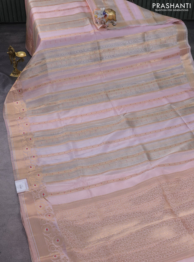 Banarasi tissue semi silk saree baby pink and peach shade with allover zari weaves and zari woven floral border
