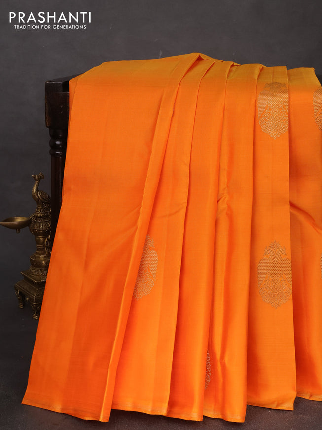 Pure kanchipuram silk saree dual shade of orange and green with zari woven buttas and piping border