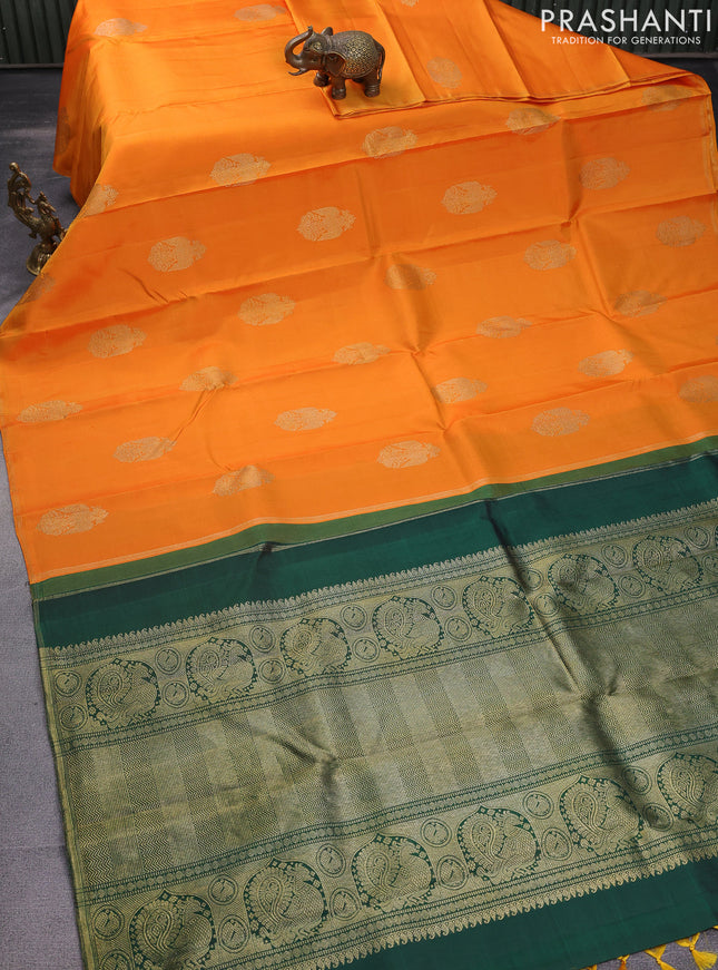 Pure kanchipuram silk saree dual shade of orange and green with zari woven buttas and piping border