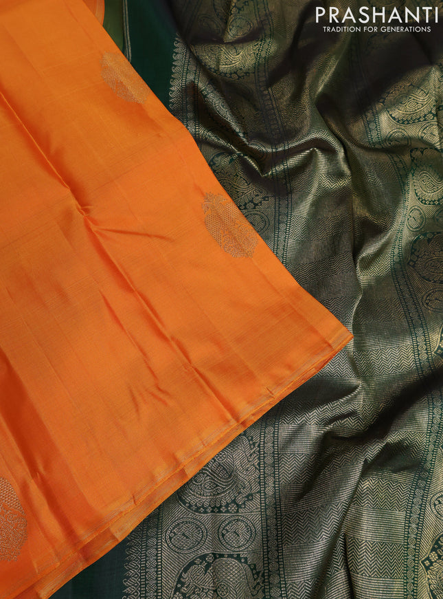 Pure kanchipuram silk saree dual shade of orange and green with zari woven buttas and piping border