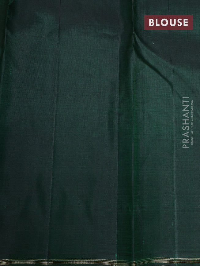 Pure kanchipuram silk saree dual shade of orange and green with zari woven buttas and piping border