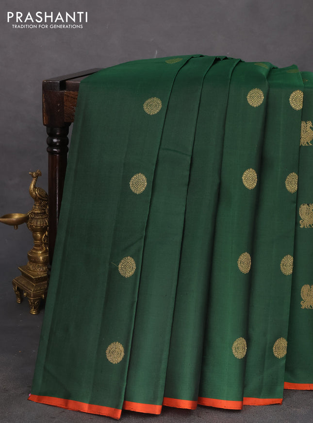 Pure kanchipuram silk saree dark green and rustic orange with annam & rudhraksha zari woven buttas and piping border