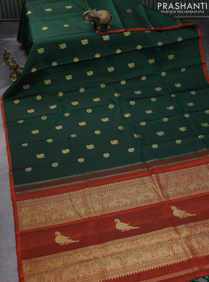 Pure kanchipuram silk saree dark green and rustic orange with annam & rudhraksha zari woven buttas and piping border
