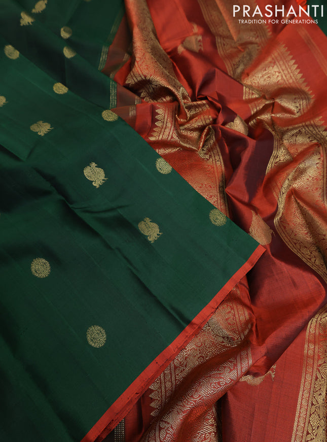 Pure kanchipuram silk saree dark green and rustic orange with annam & rudhraksha zari woven buttas and piping border
