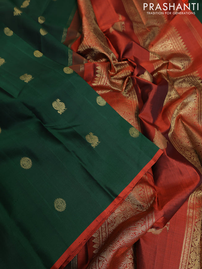 Pure kanchipuram silk saree dark green and rustic orange with annam & rudhraksha zari woven buttas and piping border