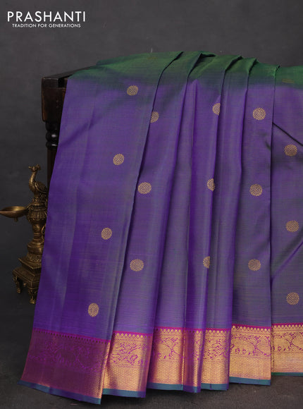 Pure kanchipuram silk saree dual shade of greenish violet and purple with allover zari weaves & buttas and elephant & annam zari woven border