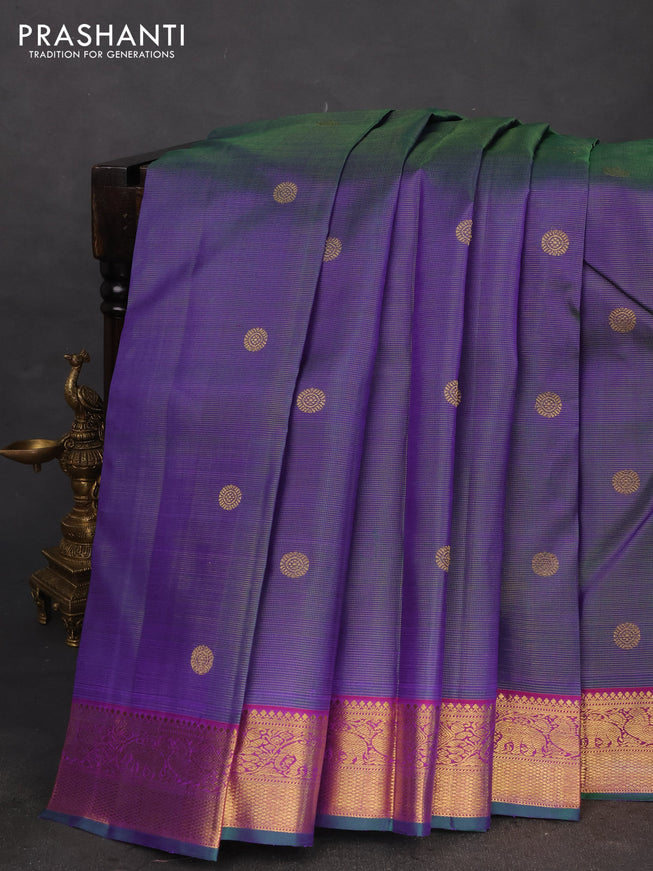Pure kanchipuram silk saree dual shade of greenish violet and purple with allover zari weaves & buttas and elephant & annam zari woven border