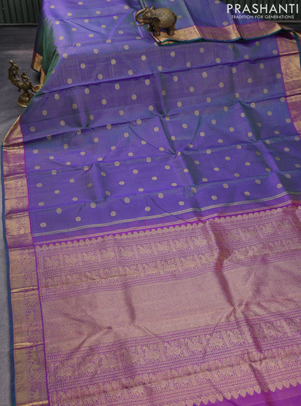 Pure kanchipuram silk saree dual shade of greenish violet and purple with allover zari weaves & buttas and elephant & annam zari woven border