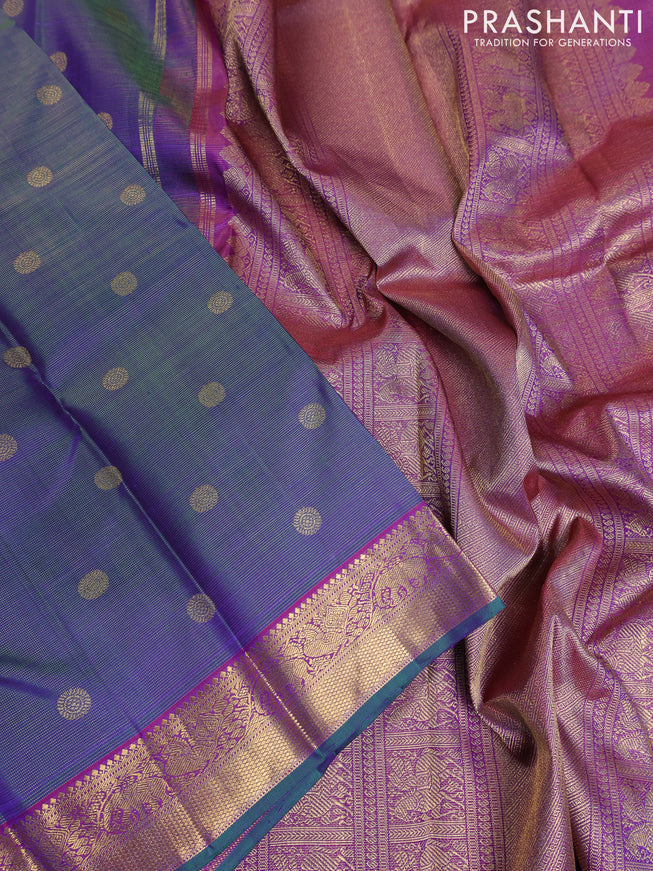 Pure kanchipuram silk saree dual shade of greenish violet and purple with allover zari weaves & buttas and elephant & annam zari woven border