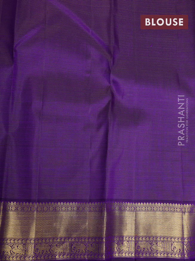 Pure kanchipuram silk saree violet with allover zari weaves & buttas and rich zari woven border