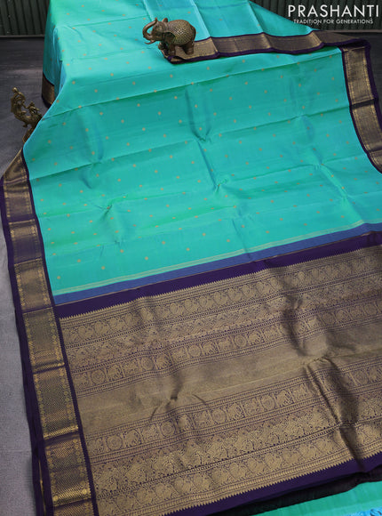 Pure kanchipuram silk saree dual shade of teal blue and dark blue with zari woven buttas and rich zari woven korvai border