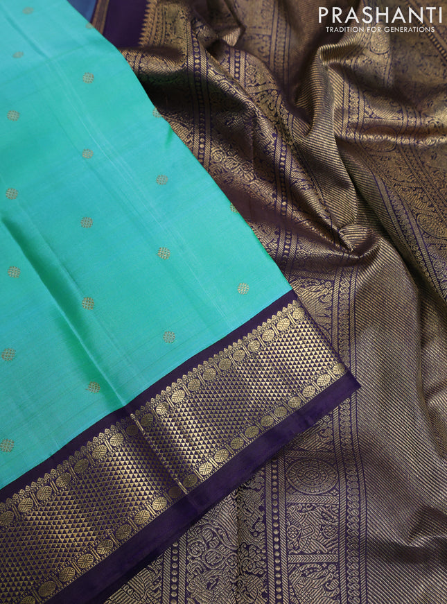 Pure kanchipuram silk saree dual shade of teal blue and dark blue with zari woven buttas and rich zari woven korvai border