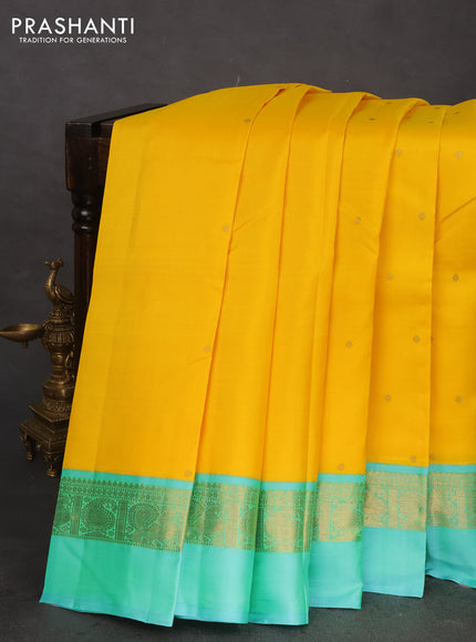 Pure kanchipuram silk saree yellow and teal blue with zari woven buttas and zari woven simple border
