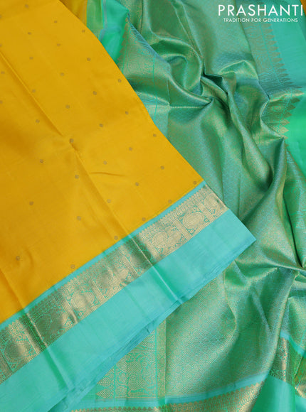Pure kanchipuram silk saree yellow and teal blue with zari woven buttas and zari woven simple border